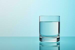 AI Generated A glass of clean drinking water on a light blue background photo