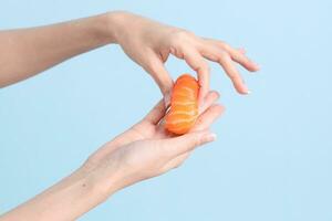 Hand with Sushi photo