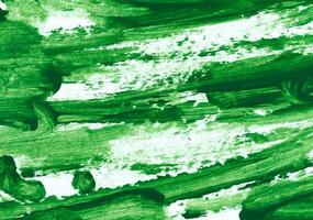 Texture of green dried acrylic paint, close up photo