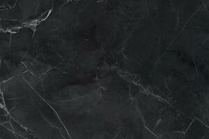 Close up of black marble textured background photo