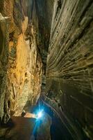 Unseen in Thailand, the blue cave features a natural blue marble color pattern on its walls. photo