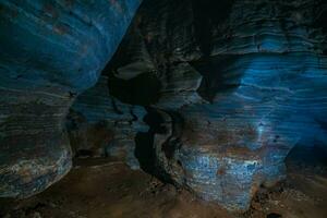 Unseen in Thailand, the blue cave features a natural blue marble color pattern on its walls. photo