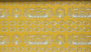 Siger or traditional crown Lampung yellow color pattern for abstract background. Ethnic Lampung Pattern. Yellow tapis pattern special Lampung. typical crown of Lampung pattern abstract photo