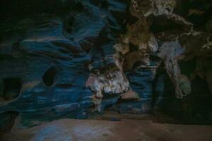 Unseen in Thailand, the blue cave features a natural blue marble color pattern on its walls. photo