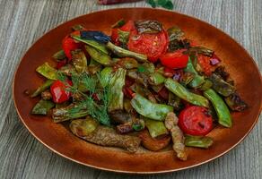 Stir fried pork with vegetables photo