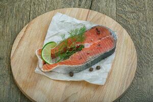 Raw salmon steak photo