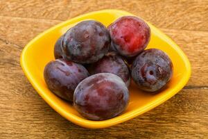 Plums in the bowl photo