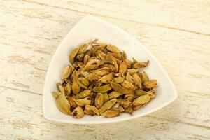 Dry cardamom seeds photo