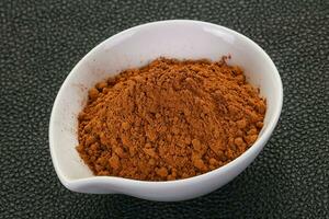 Cocoa powder in the bowl photo