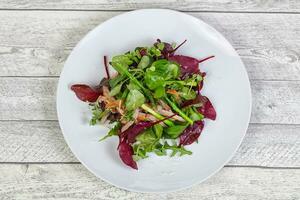 Mix salad with meat and asparagus photo