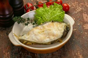 Baked wolffish steak photo