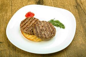 Grilled burger cutlet photo