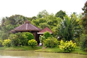 Thai building on the river photo