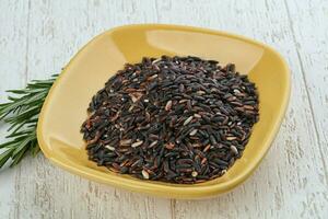 Wild rice in the bowl photo