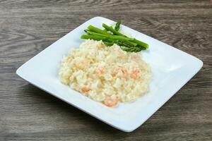 Risotto with shrimps and astaragus photo