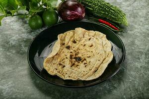 Indian traditional tandori bread - Roti photo