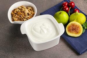 Traditional homemade Greek yoghurt with granola photo