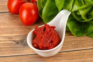 Tomato puree sauce for cooking photo