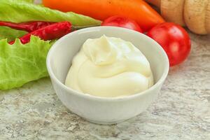 Organic mayonnaise sauce in the bowl photo