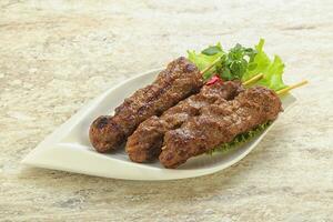 Beef kebab skewer minced meat photo