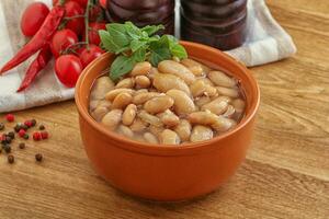 Whinte canned kidney beans in the bowl photo