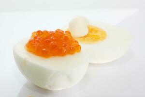 eggs with red caviar photo