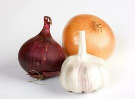 garlic and onion vegetables on white background photo
