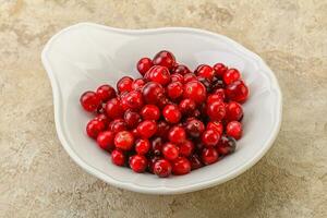 Sweet and tasty cranberry in the bowl photo