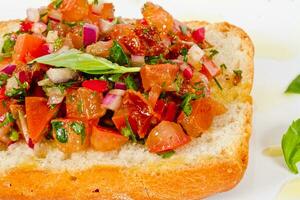 Bruschetta Italian Toasted Garlic Bread with tomato photo