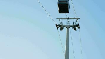 Cable car line with passengers running at summer afternoon video