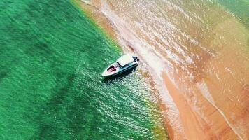 Aerial drone shot of speed boat and separate sea video