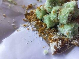 Kue putu bambu is traditional cake from indonesia which is made from rice flour photo