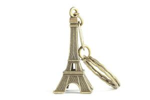 Eiffel Tower keychain isolated on white photo