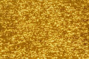 view on golden sunshine in water photo