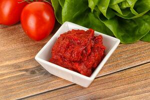 Tomato puree sauce for cooking photo