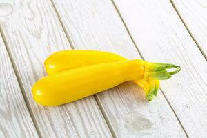 Yellow young zucchini for cooking photo