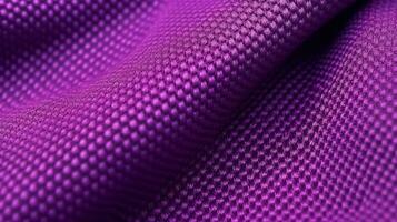 Purple soccer fabric texture with air mesh. Sportswear background photo