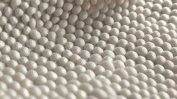 Beige soccer fabric texture with air mesh. Sportswear background photo