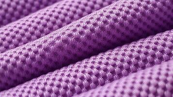 Purple soccer fabric texture with air mesh. Athletic wear backdrop photo