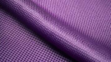 Purple soccer fabric texture with air mesh. Sportswear background photo