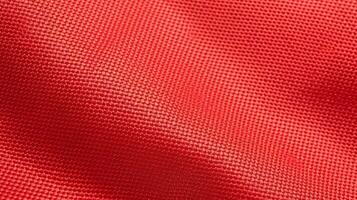 rojo fútbol tela textura con aire malla. ropa de deporte antecedentes foto