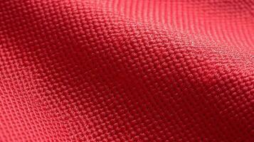 Red soccer fabric texture with air mesh. Sportswear background photo