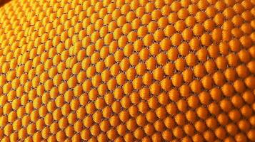 Orange soccer fabric texture with air mesh. Athletic wear backdrop photo