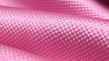 Pink soccer fabric texture with air mesh. Athletic wear backdrop photo