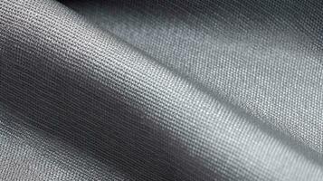 Grey football apparel with air mesh texture. Sportswear background photo