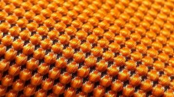 Orange soccer fabric texture with air mesh. Sportswear background photo