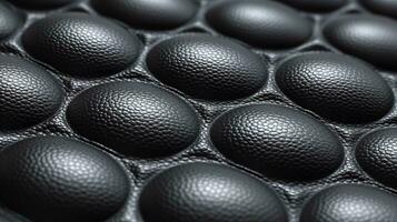 Black soccer fabric texture with air mesh. Sportswear background photo