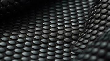 Black soccer fabric texture with air mesh. Sportswear background photo