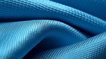 Blue soccer fabric texture with air mesh. Sportswear background photo