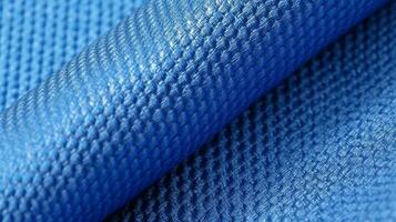 Blue soccer fabric texture with air mesh. Sportswear background photo